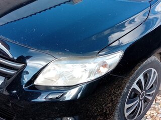 2009 Toyota Corolla X (E140, E150), чёрный, 650000 рублей, вид 1