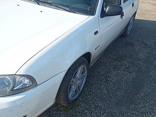 2010 Daewoo Nexia I Рестайлинг, белый, 199000 рублей, вид 2