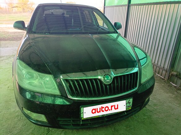 2013 Skoda Octavia II (A5) Рестайлинг, чёрный, 920000 рублей - вид 1