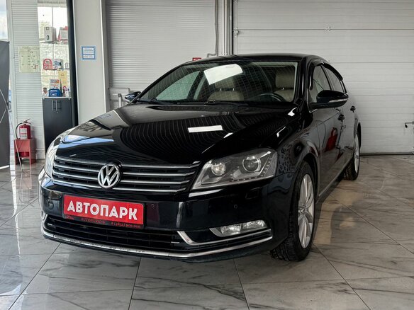 2012 Volkswagen Passat B7, чёрный - вид 1