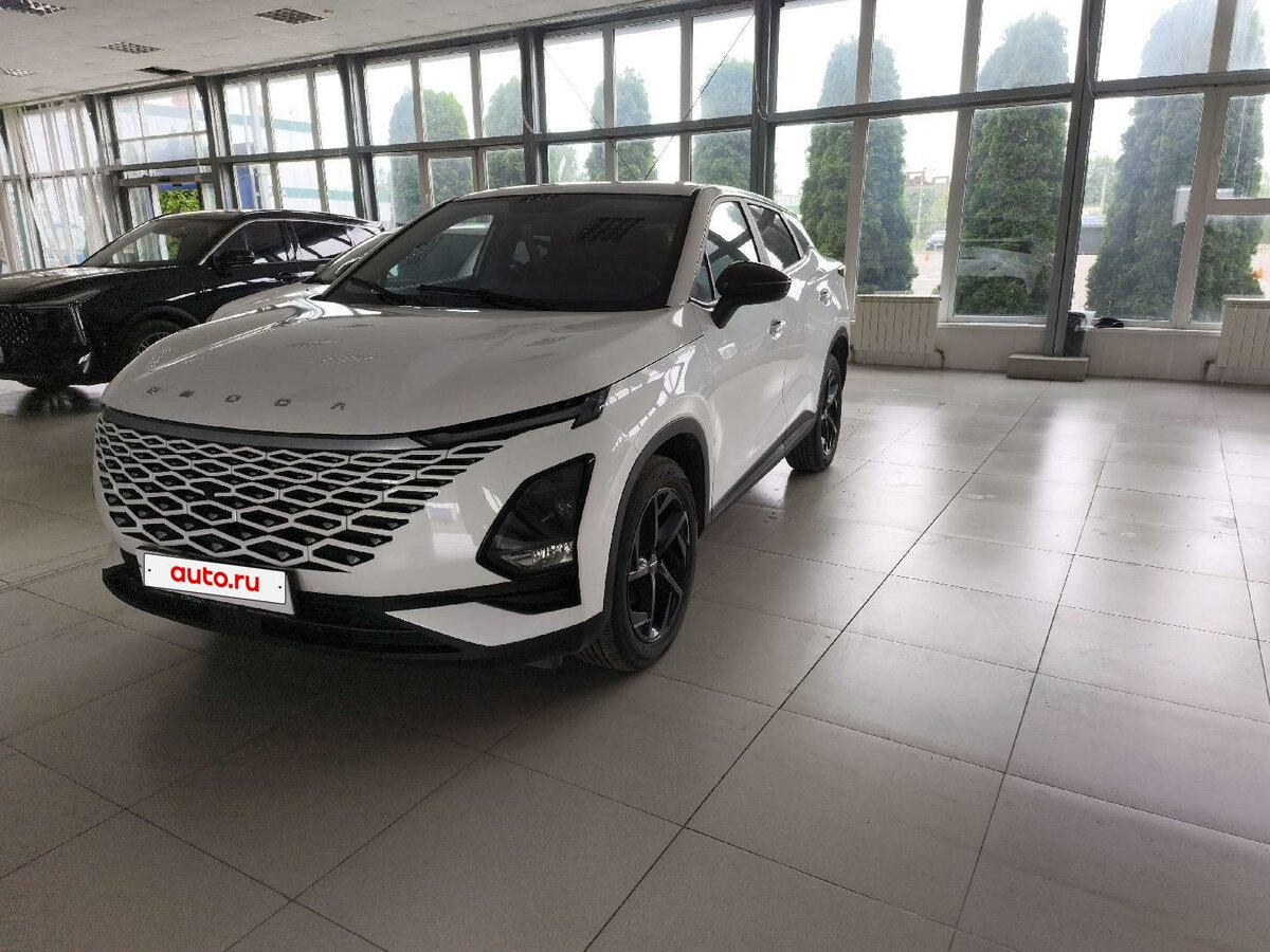 Открыть фотографии: Omoda C5 I