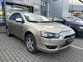 2007 Mitsubishi Lancer X, бежевый, 472000 рублей - вид 2