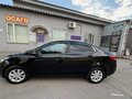 2016 Kia Rio III Рестайлинг, чёрный, 850000 рублей - вид 2