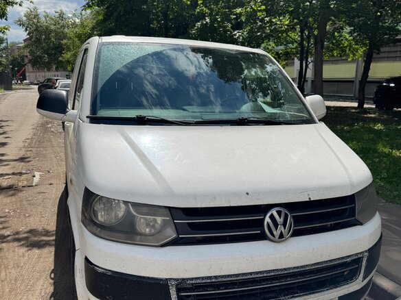 2010 Volkswagen Multivan T5 Рестайлинг, белый, 1300000 рублей