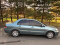 2006 Mitsubishi Lancer IX Рестайлинг, зелёный, 300000 рублей - вид 2