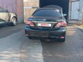 2012 Toyota Corolla X (E140, E150) Рестайлинг, чёрный, 1200000 рублей - вид 2
