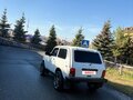 2010 Lada (ВАЗ) 2121 (4x4) I Рестайлинг, белый, 280000 рублей - вид 1