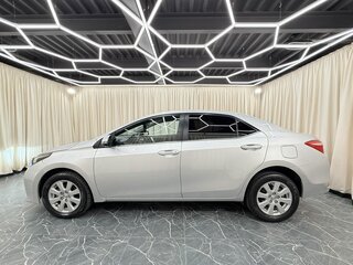 2014 Toyota Corolla XI (E160, E170, E180), серебристый, 1329000 рублей, вид 3