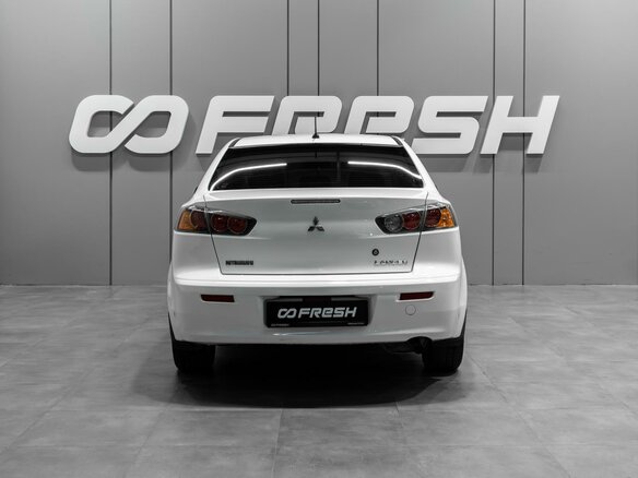 2014 Mitsubishi Lancer X Рестайлинг, белый, 1040000 рублей - вид 3