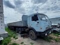 2002 КамАЗ 54115, серый, 850000 рублей - вид 1