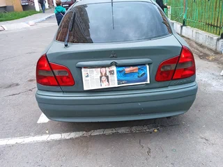 2000 Mitsubishi Carisma I Рестайлинг, зелёный, 170000 рублей, вид 4