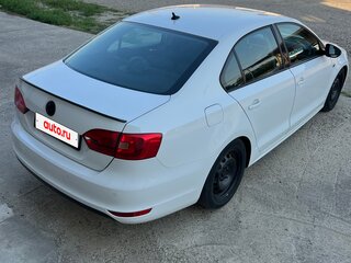 2011 Volkswagen Jetta VI, белый, 950000 рублей, вид 2