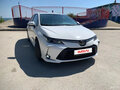 2021 Toyota Corolla XII (E210), белый, 1750000 рублей