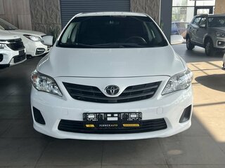 2012 Toyota Corolla X (E140, E150) Рестайлинг, белый, 940000 рублей, вид 2