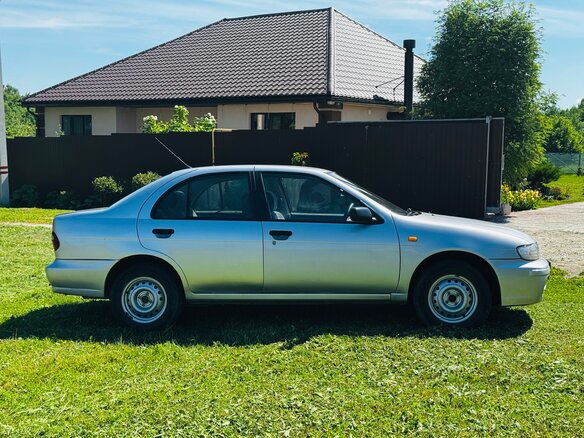 1998 Nissan Almera I (N15), серебристый, 265000 рублей - вид 2
