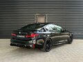 2018 BMW M5 Competition VI (F90), чёрный, 7313000 рублей - вид 4