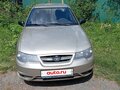 2012 Daewoo Nexia I Рестайлинг, жёлтый, 200000 рублей