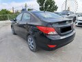 2014 Hyundai Solaris I, чёрный, 630000 рублей - вид 4