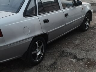 2012 Daewoo Nexia I Рестайлинг, серебристый, 298000 рублей, вид 3