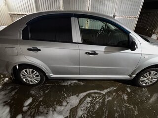 2011 Chevrolet Aveo I Рестайлинг, серебристый, 385000 рублей, вид 4