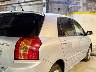 2006 Toyota Corolla IX (E120, E130) Рестайлинг, голубой, 380000 рублей, вид 4