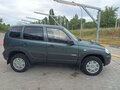 2015 Chevrolet Niva I Рестайлинг, зелёный, 625000 рублей - вид 2
