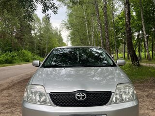 2004 Toyota Corolla IX (E120, E130), серебристый, 570000 рублей, вид 2
