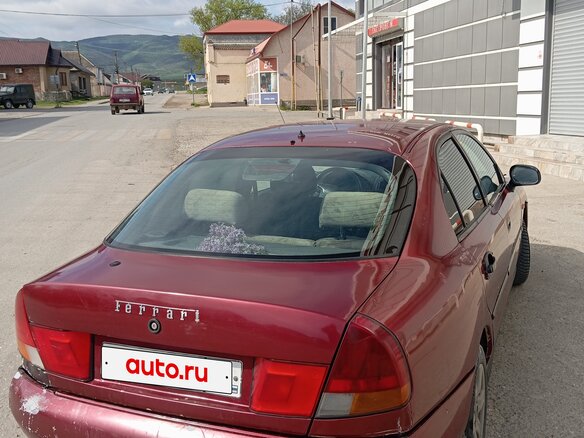 1998 Mitsubishi Carisma I, красный, 89999 рублей - вид 3
