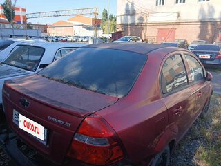 2011 Chevrolet Aveo I Рестайлинг, красный, 232500 рублей, вид 5