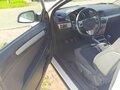 2010 Opel Astra GTC H Рестайлинг, белый, 480000 рублей - вид 8