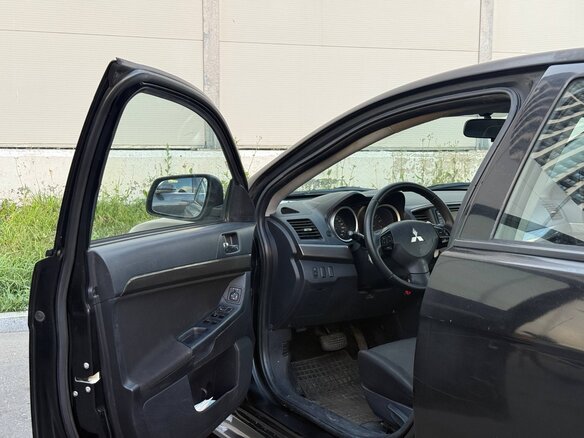 2007 Mitsubishi Lancer X, чёрный - вид 6