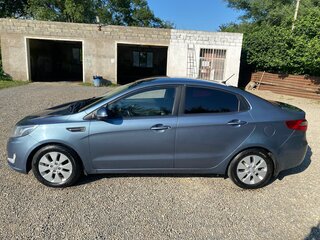 2014 Kia Rio 5-speed III, голубой, 650000 рублей, вид 5