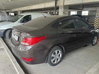2015 Hyundai Solaris I Рестайлинг, коричневый, 790000 рублей, вид 4