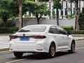 2023 Toyota Corolla XII (E210) Рестайлинг, белый, 1205000 рублей - вид 3