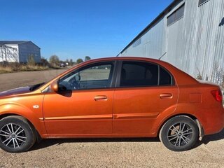 2011 Kia Rio II Рестайлинг, оранжевый, 650000 рублей, вид 4