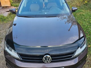 2016 Volkswagen Jetta VI Рестайлинг, коричневый, 1650000 рублей, вид 1