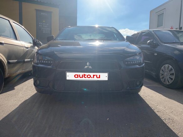 2007 Mitsubishi Lancer X, чёрный - вид 2