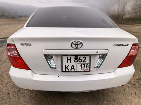 2006 Toyota Corolla IX (E120, E130) Рестайлинг, белый, 600000 рублей, вид 4