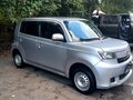 2010 Toyota bB II Рестайлинг, серебристый, 400000 рублей - вид 1