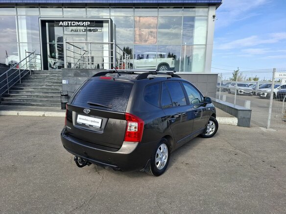 2010 Kia Carens II (UN), коричневый, 740000 рублей - вид 4