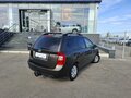 2010 Kia Carens II (UN), коричневый, 740000 рублей - вид 4