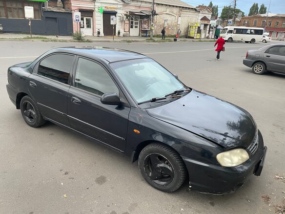 2006 Kia Spectra I Рестайлинг 2, чёрный - вид 1