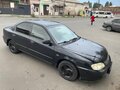 2006 Kia Spectra I Рестайлинг 2, чёрный - вид 1