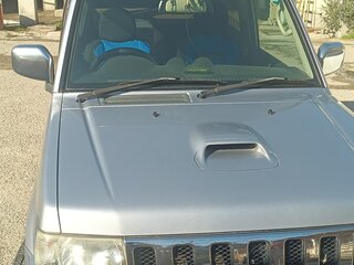 2010 Mitsubishi Pajero Mini II, серебристый, 670000 рублей, вид 1