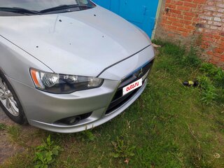 2011 Mitsubishi Lancer X Рестайлинг, серебристый, 570000 рублей, вид 4