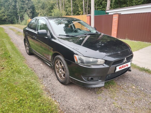 2008 Mitsubishi Lancer X, чёрный - вид 1