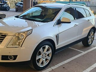 2014 Cadillac SRX II Рестайлинг, белый, 2000000 рублей, вид 1