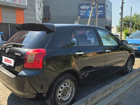2002 Toyota Corolla IX (E120, E130), чёрный, вид 4