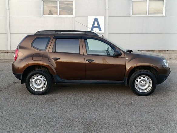 2013 Renault Duster I, коричневый, 790000 рублей - вид 3