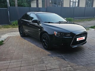 2011 Mitsubishi Lancer X Рестайлинг, чёрный, 910000 рублей, вид 1